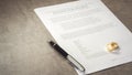 Divorce decree form with ring Royalty Free Stock Photo