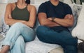 Divorce, fight and couple with arms crossed anger on a sofa frustrated by liar, cheating or breakup threat at home Royalty Free Stock Photo