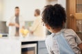 Divorce, gay couple and girl child watching parents argue in kitchen with stress, worry or fear at home. Family, crisis Royalty Free Stock Photo