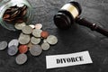 Divorce message with coins and gavel