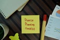 Divorce Planning Checklist write on sticky notes isolated on Wooden Table