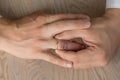 Divorce, separation: hands of man removing wedding or engagement ring Royalty Free Stock Photo