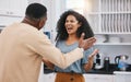 Divorce, stress and angry couple screaming in a kitchen for debt, mistake or commitment doubt at home. Marriage Royalty Free Stock Photo