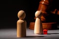 Divorse property division concept. Wooden family with house and judge gavel Royalty Free Stock Photo