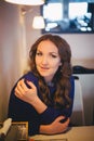 Diwa angel mystic lady woman wearing casual blue dress lonely sitting in restaurant caffe with coffe cup awaiting her boyfreind hu Royalty Free Stock Photo