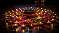 Diwali celebration - Diya oil lamps lit on colorful rangoli, generative ai Royalty Free Stock Photo