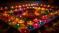 Diwali celebration - Diya oil lamps lit on colorful rangoli, generative ai Royalty Free Stock Photo