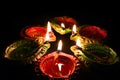 Diwali celebration,Diwali diyas or clay lamps on dark background.