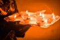 Diwali Festival Lamps in hand, Happy Dipawali, Indian Festival diwali. Female hands holding oil lamp. Celebrating Diwali or Royalty Free Stock Photo