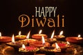 Diwali, Hindu festival of lights celebration. Diya oil lamps against dark background Royalty Free Stock Photo