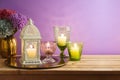 Diwali holiday concept with candles decoration on wooden table