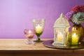 Diwali holiday concept with candles decoration on wooden table