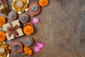Diwali holiday concept with sweet traditional dessert, gift box and decorations on dark background. Top view, flat lay Royalty Free Stock Photo