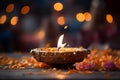 Diwali\'s essence a diya lamp amidst a blurred festival of light celebration