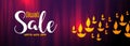 Diwali sale banner in shiny purple background with golden diya lamps Royalty Free Stock Photo