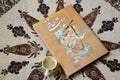 Diwan Hafez Book with Glasses and Coffee