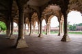 Diwan-I-Am Hall of Audience in Agra Red Fort from inside with ambient light creating soft shadows and overexposed bright sky as