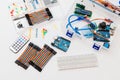 DIY arduino. Flat layout on white background, copy space. Electronic workshop components
