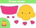 DIY children educational creative game. Paper cutting activity. Make a cute cupcake with glue and scissors