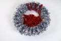 Diy Christmas wreath. Guide on the photo how to make a Christmas wreath with your own hands from a cardboard plate, tinsel, beads Royalty Free Stock Photo