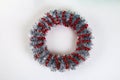 Diy Christmas wreath. Guide on the photo how to make a Christmas wreath with your own hands from a cardboard plate, tinsel, beads Royalty Free Stock Photo