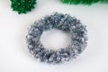 Diy Christmas wreath. Guide on the photo how to make a Christmas wreath with your own hands from a cardboard plate, tinsel, beads Royalty Free Stock Photo