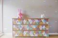 DIY colorful commode in pastel girl room Royalty Free Stock Photo