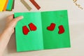 DIY concept. How to make Christmas card. New Year idea for children.