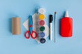 DIY crafts for kids, toilet tube roll, paper, glue, scissors, paint and brush on blue backround. Step by step, New Year Royalty Free Stock Photo