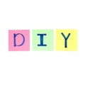 DIY do it yourself. Lettering in paper on white. Royalty Free Stock Photo