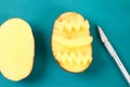 Diy Easter eggs made of cardboard and potato stamp, Easter greeting card on green background