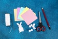 Diy Easter garland bunnies, flags EASTER made paper blue background. Gift idea, decor Spring, Easter Royalty Free Stock Photo