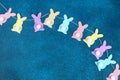 Diy Easter garland bunnies, flags EASTER made paper blue background. Gift idea, decor Spring, Easter Royalty Free Stock Photo