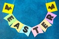 Diy Easter garland bunnies, flags EASTER made paper blue background. Gift idea, decor Spring, Easter Royalty Free Stock Photo