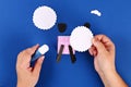 Diy Eid al adha lamb sheep sweet candy paper, wooden sticks for ice cream on blue background