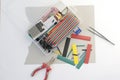 DIY electronics hobby kit opened heatshrink laying around on the grey background. DIY engineer electronic kit set. Royalty Free Stock Photo