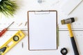 Diy equipment with empty white clipboard on the table, diy and repair home concept Royalty Free Stock Photo