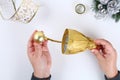 DIY gold bell from a plastic bottle. Guide on the photo how to make a decorative bell from a bottle, paper and a Christmas ball