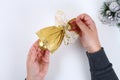 DIY gold bell from a plastic bottle. Guide on the photo how to make a decorative bell from a bottle, paper and a Christmas ball