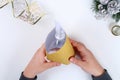 DIY gold bell from a plastic bottle. Guide on the photo how to make a decorative bell from a bottle, paper and a Christmas ball