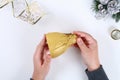DIY gold bell from a plastic bottle. Guide on the photo how to make a decorative bell from a bottle, paper and a Christmas ball