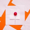 DIY Halloween candy ghost step by step. Image two. Put a smaller square on a large napkin and candy on it.