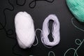 DIY Halloween thread ghost step by step. Image one. Unwind the threads from the ball as shown.