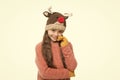 Diy and handmade handcrafted goods. Playful cutie. Adorable baby wear cute winter knitted deer hat. Cute reindeer with