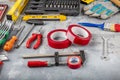 DIY and home improvement banner with work and construction tools on a wooden workbench top view, copy space at center. Royalty Free Stock Photo