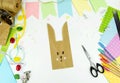 DIY and kids creativity. Step by step instructions: how to make an Easter bunny packaging from a craft bag. Step5. Easter handmade