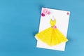 Diy Mothers Day greeting card with a paper napkin dress and flower decoration Royalty Free Stock Photo