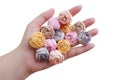 Thirteen pieces pastel flowers made out of fabric for DIY embellishment and decoration on hand