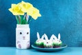 Diy rabbit from easter eggs on blue background. Gift ideas, decor Easter, spring. Handmade Royalty Free Stock Photo