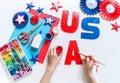 Diy 4th of July decor USA letters color American flag. Children craft